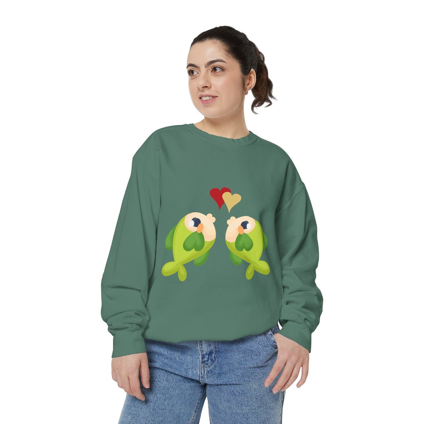 Two hearts float between the fish one red and one yellow Unisex Garment-Dyed Sweatshirt