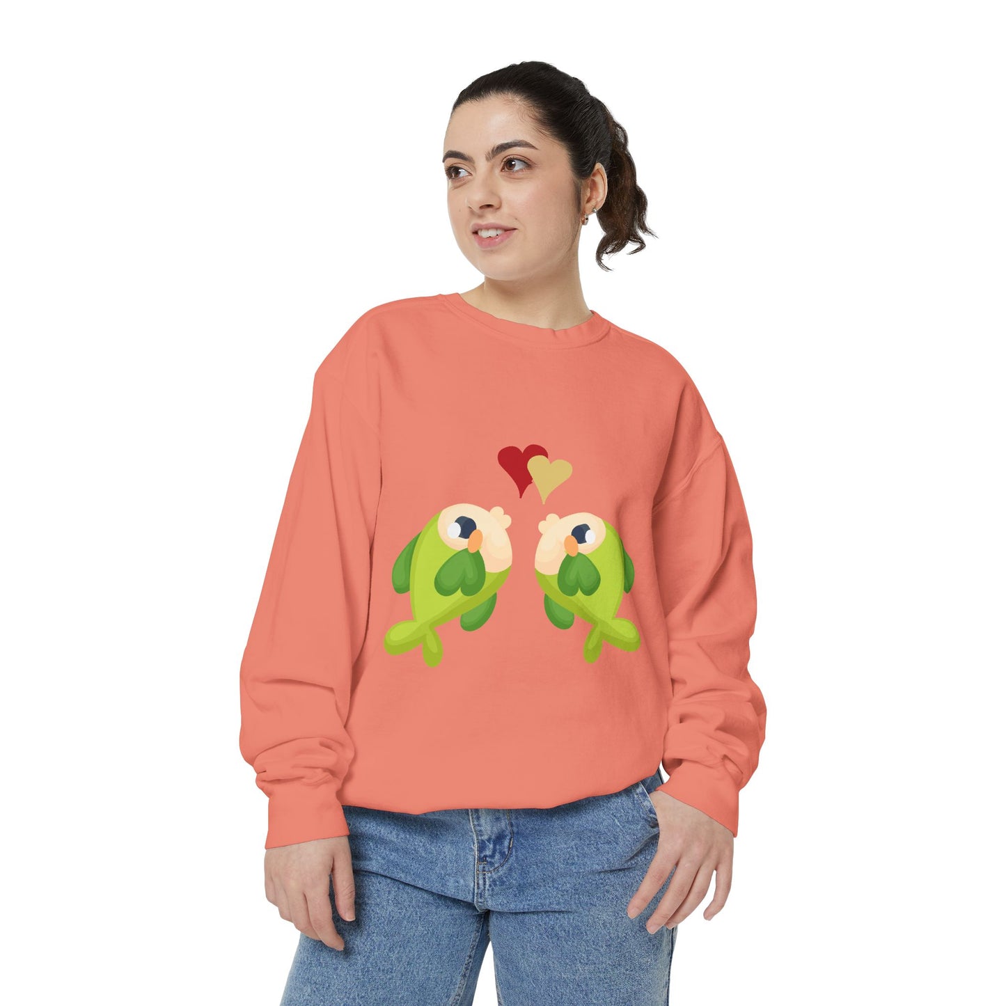 Two hearts float between the fish one red and one yellow Unisex Garment-Dyed Sweatshirt