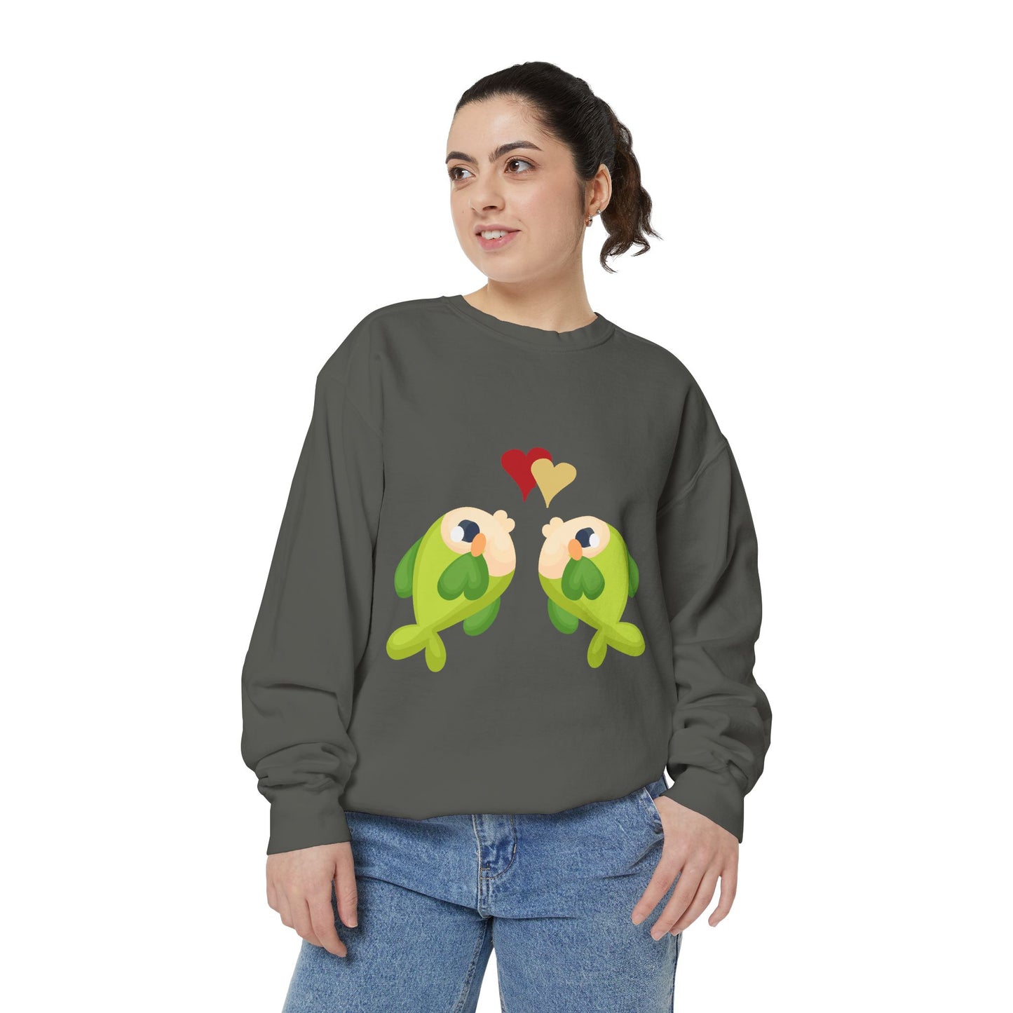 Two hearts float between the fish one red and one yellow Unisex Garment-Dyed Sweatshirt